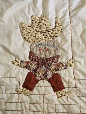 Vintage 1970s Cowboy Bill 56in. x 37in. Western Themed Applique Crib Baby Quilt